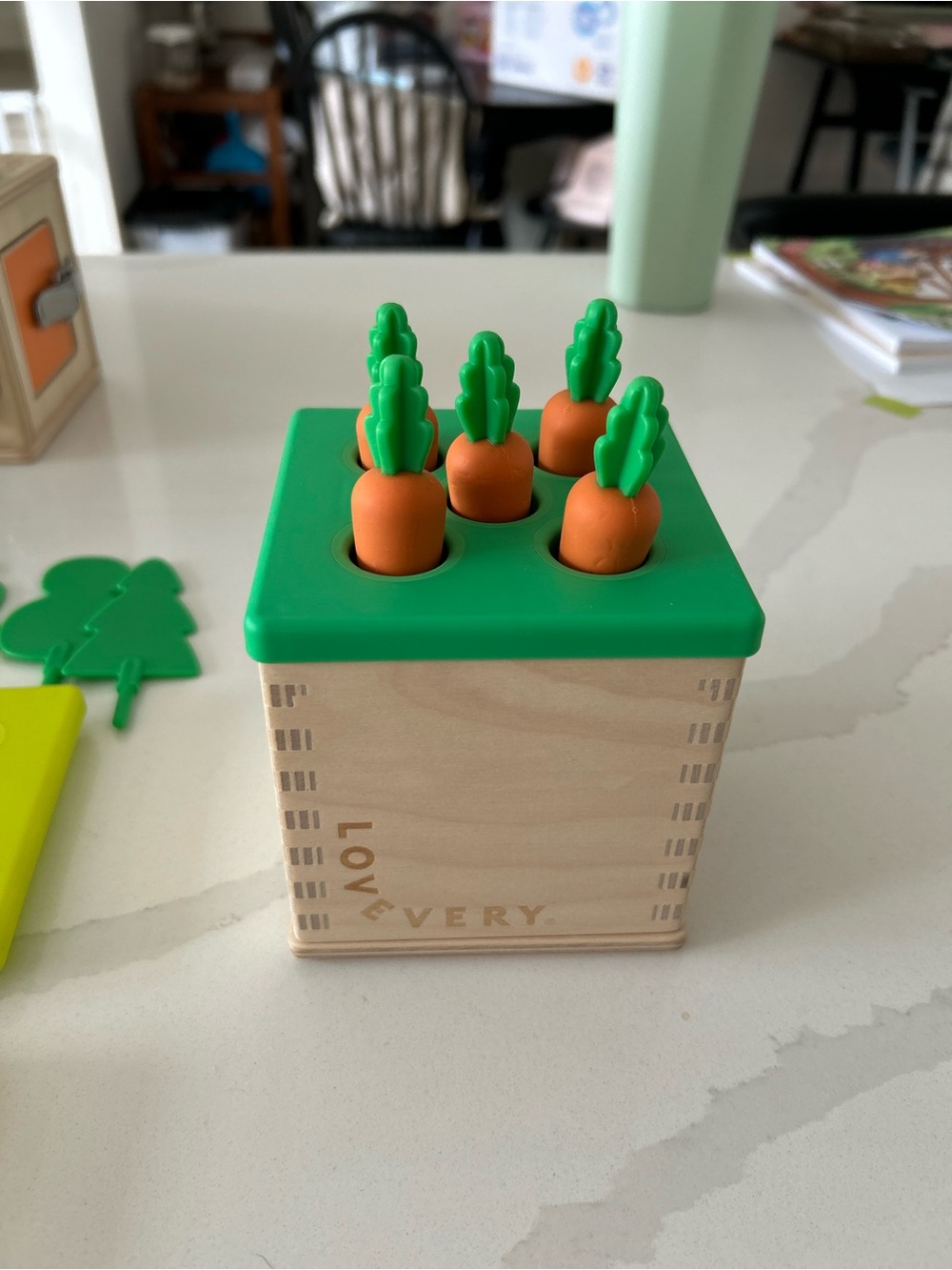 lovevery carrot, coins and tree box thing